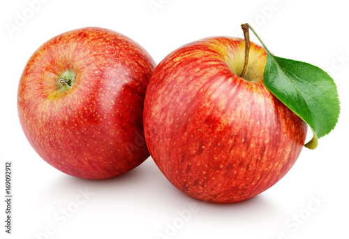 Two ripe red apple fruits with green leaf isolated on white background. Red apples with clipping path