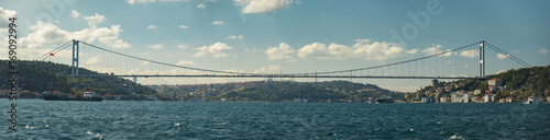Panoramic view of Fatih Sultan Mehmet Suspension Bridge over Bosphorus in Istanbul Turkey photo