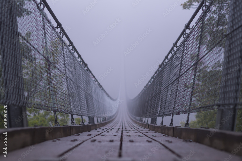 bridge transitioning into fog