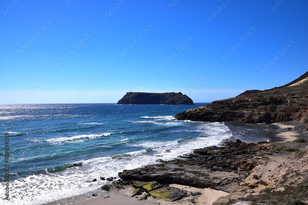 Rocky beach cove on the Portuguese island of Porto Santo, north of Madeira 
