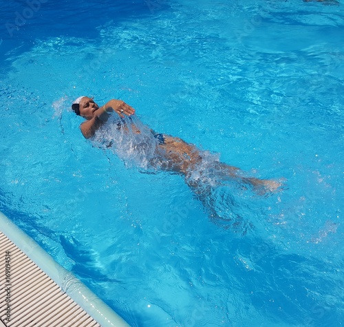 Woman swimming in the pool