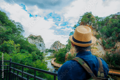Travel woman looking at beautiful landscape in Thailand.
