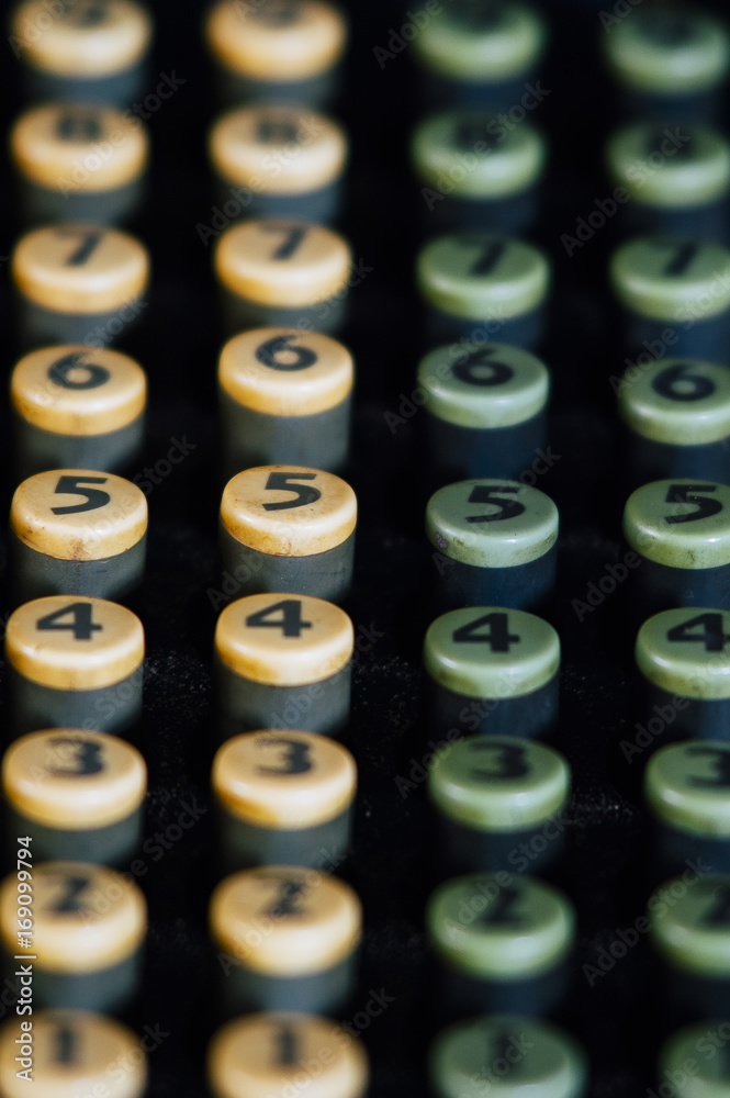 Macro View of Numbered Buttons on Antique Adding Machine Macro View of Numbered Buttons on Antique Adding Machine