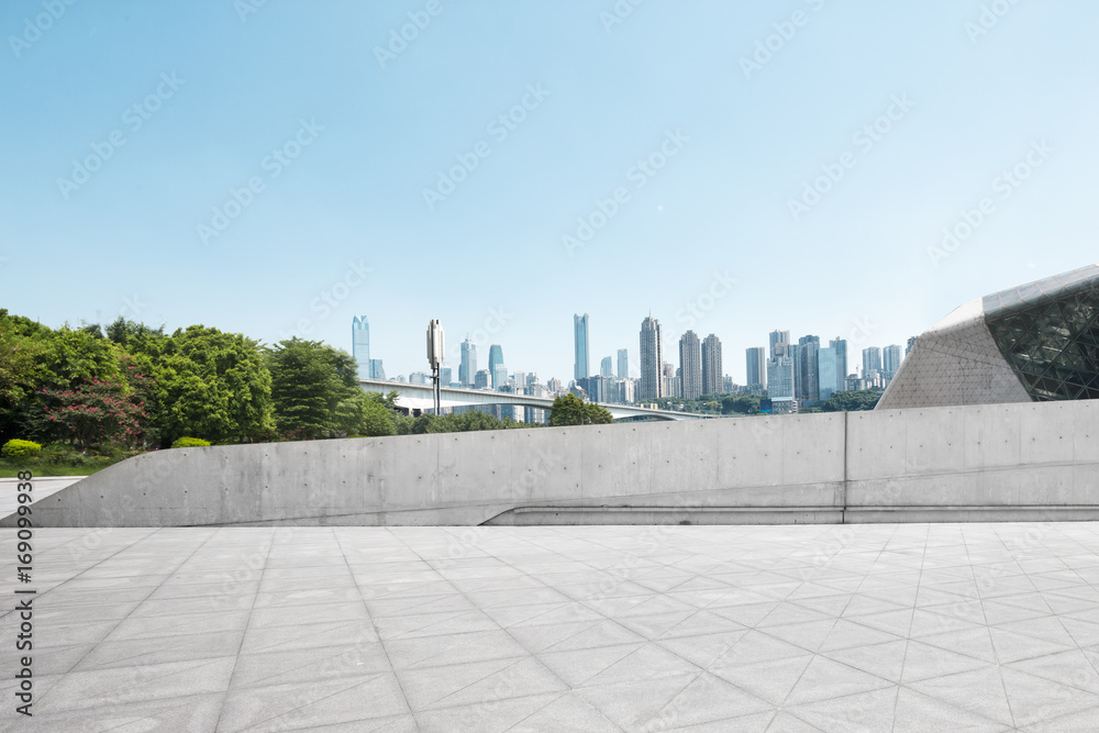 empty marble floor and cityscape of modern city