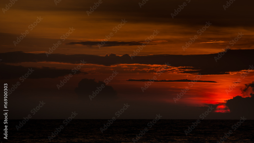Magic sunset view seascape with beautiful colorful sky, sun and clouds Magic sunset view seascape with beautiful colorful sky, sun and clouds