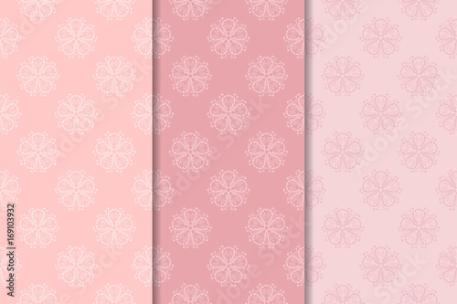 Set of floral colored seamless patterns. Pale pink backgrounds