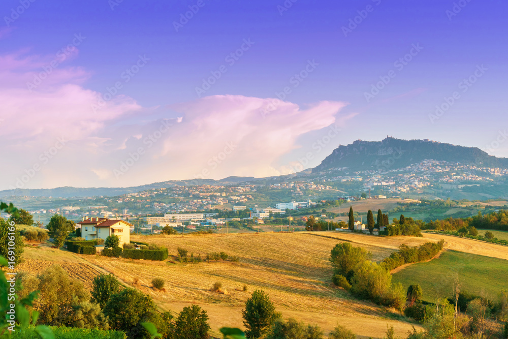 Emilia Romania region, Italy with wheat fields and San Marino on horizon.