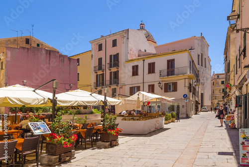 Alghero, Sardinia, Italy. Summer restaurant in the historical center photo