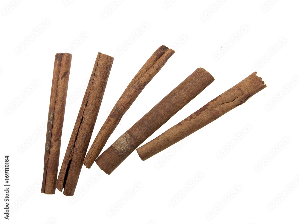 Cinnamon sticks on white background. The view from the top Cinnamon sticks on white background. The view from the top