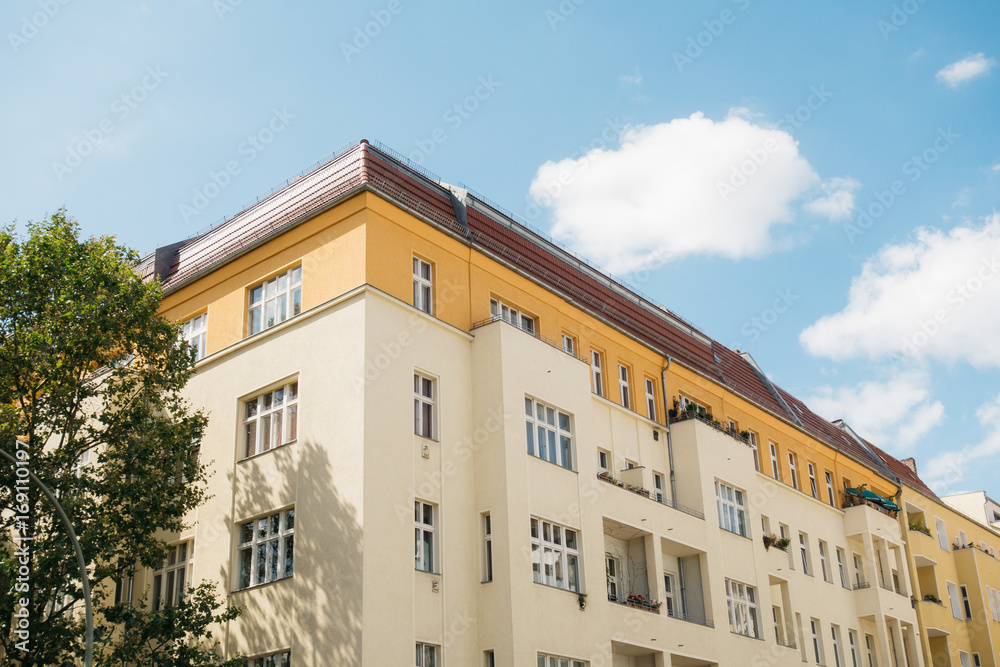 yellow and orange corner house at berlin