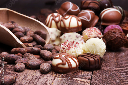 a lot of variety chocolate pralines, belgian confectionery gourmet chocolate photo