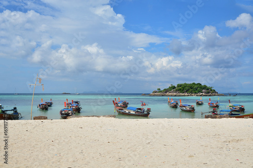 Tropical white sand and blue sea with blue sky at Andaman Sea. Lipe Island, Satun, Thailand. © kritiya