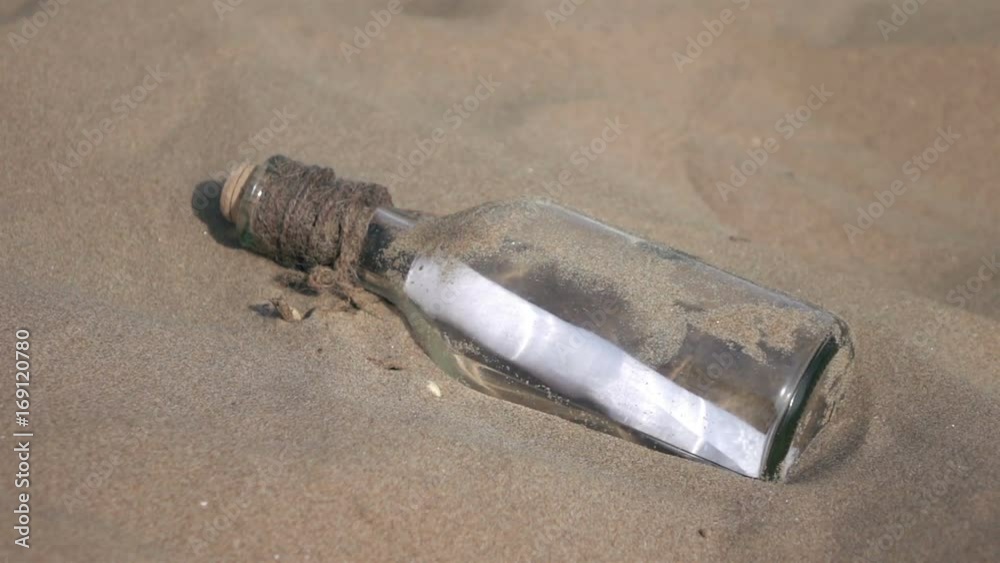 High quality video of message in the bottle on the beach in real 1080p slow motion 250fps.  More videos from this series in my portfolio