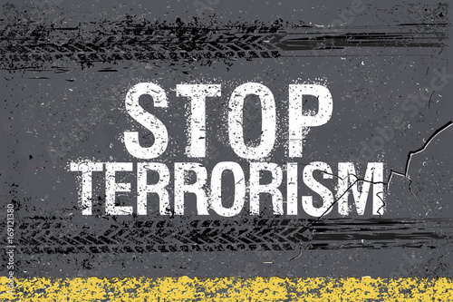 Trace of tires and stop terrorism inscription on the asphalt of the city as Appeal against the present terror