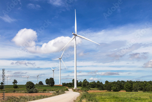 Wallpaper Mural white wind turbines generating electricity in wind power station under blue sky background         Torontodigital.ca