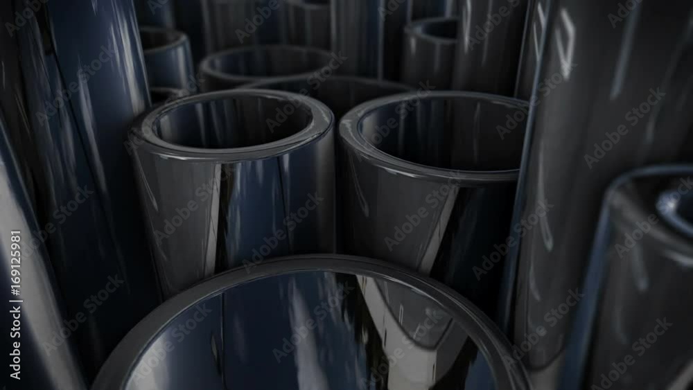 Industrial manufacturing business production concept. Many shiny steel pipes. Industrial manufacturing business production concept. Many shiny steel pipes.