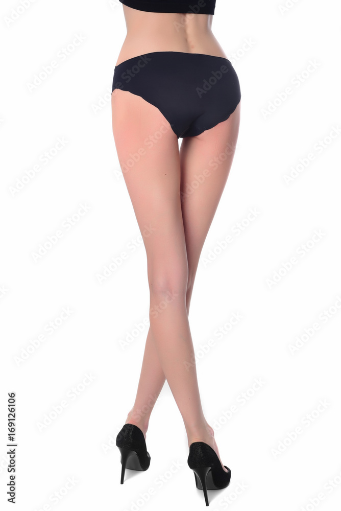 Beauty concept. Perfect female legs and body wearing high heels. Beauty concept. Perfect female legs and body wearing high heels.