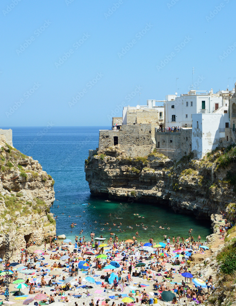 Aerial view of Polignano a mare beach and cliffs, Apulia, southern Italy