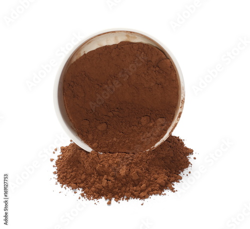 pile cocoa powder in white porcelain bowl isolated on white background