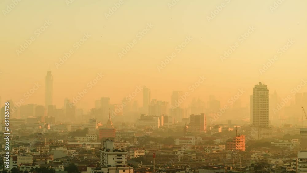Timelapse of the smog over the Bangkok city while dawn, Thailand