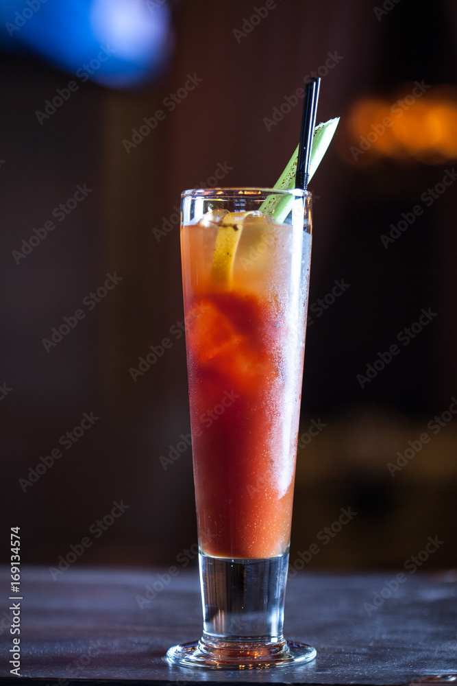 closeup of bloody mary cocktail on a dark background at the bar closeup of bloody mary cocktail on a dark background at the bar