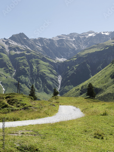 Scenic Alpine rocky alpine valley of Sportgastein in summer. Picturesque mountain pasturelands  great mountain massif and sunny weather. Sport hiking landscape background.