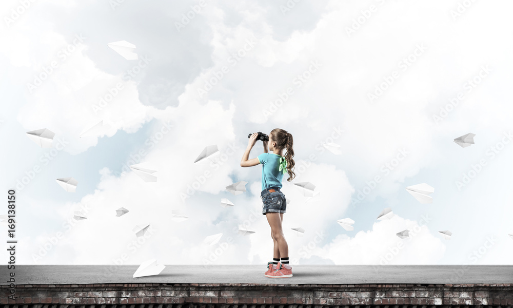 Concept of careless happy childhood with girl of school age look Concept of careless happy childhood with girl of school age look