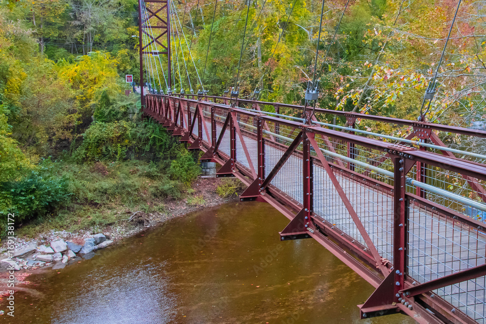 hanging bridge over Patapsco river in Maryland showing autumn fall color hanging bridge over Patapsco river in Maryland showing autumn fall color