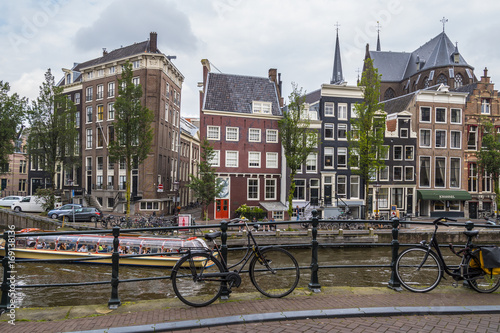 Typical view over the canals in Amsterdam city center - AMSTERDAM - THE NETHERLANDS - JULY 20, 2017 © 4kclips