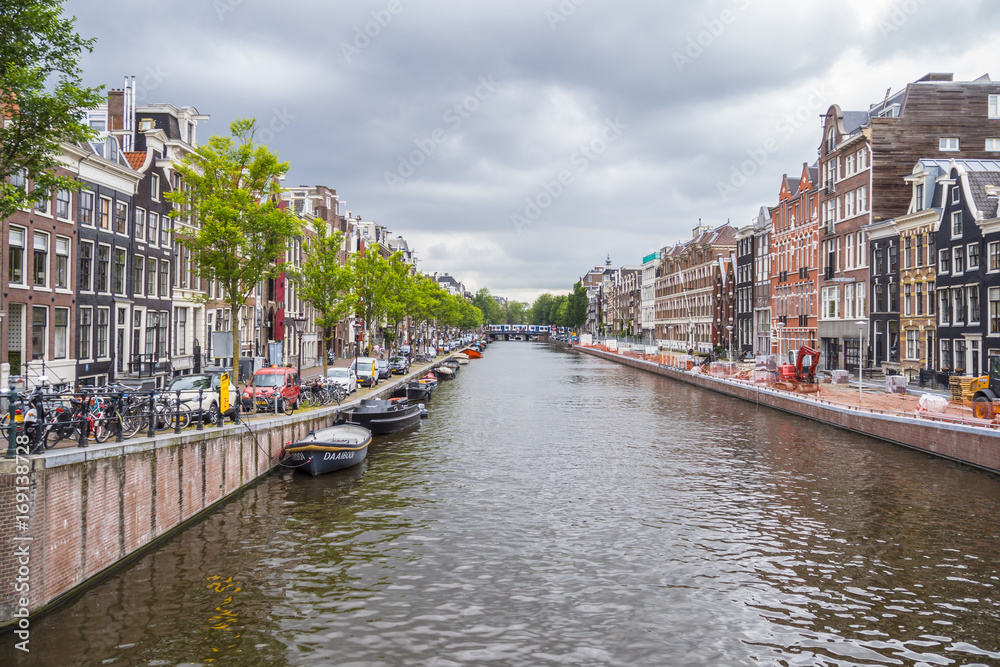 The amazing canals in the city center of Amsterdam - very romantic - AMSTERDAM - THE NETHERLANDS - JULY 20, 2017