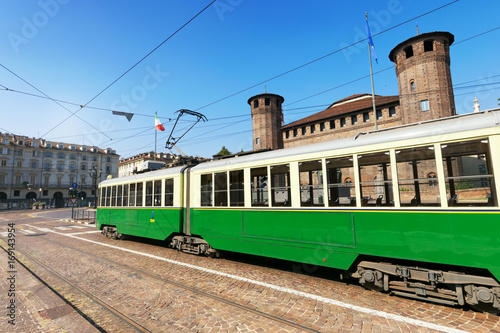 Historical green tram in Piazza Castello, Turin, Italy