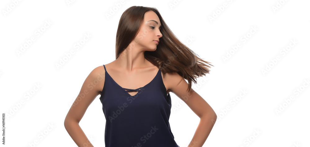 A young beautiful woman touching her hair. isolated A young beautiful woman touching her hair. isolated