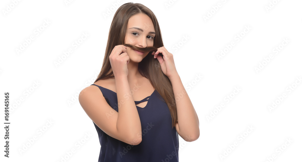 A young beautiful woman touching her hair. isolated A young beautiful woman touching her hair. isolated