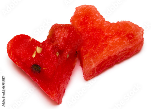 pieces of watermelon in shape of heart isolated on white background