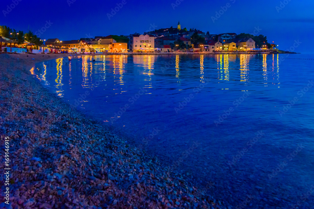 Primosten night beach view. / Scenic night view at Primosten coastal town, Croatia.