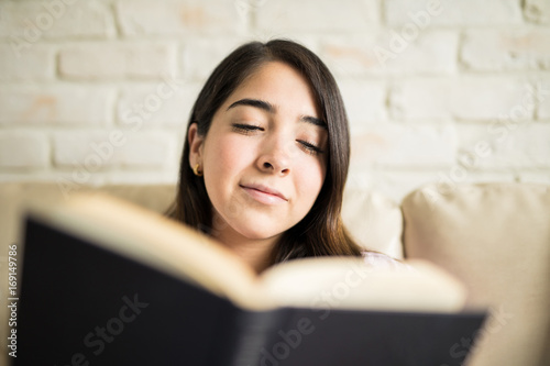 Young woman enjoying literature