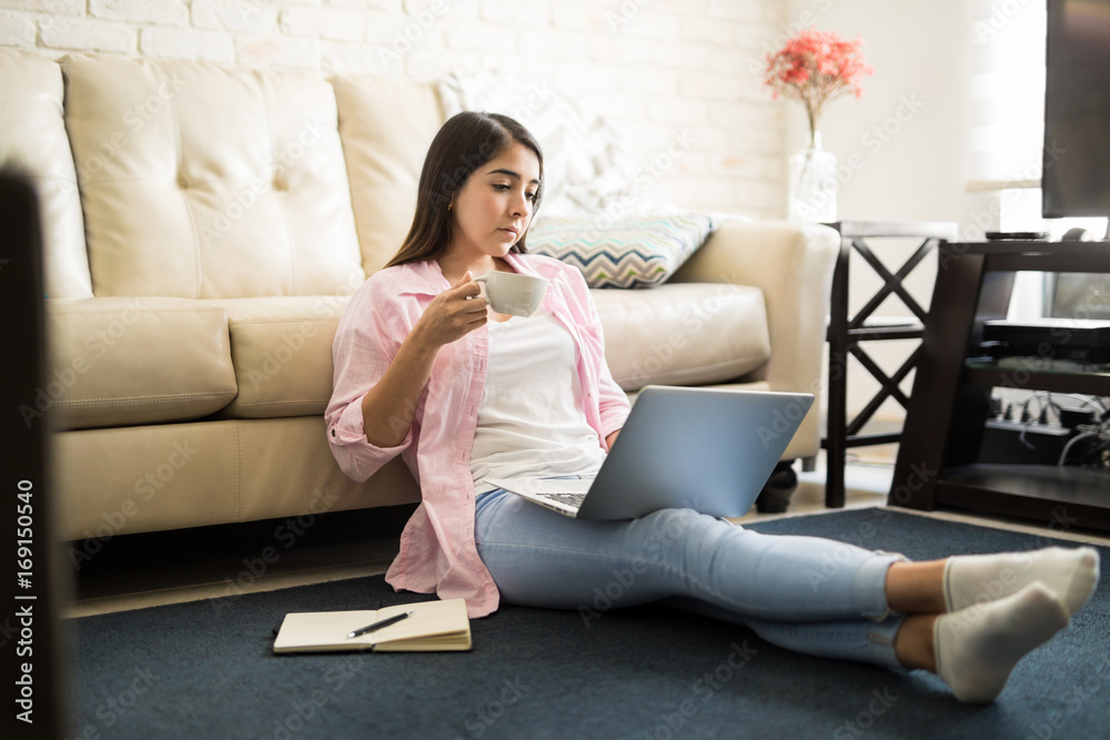 Working at home with a cup of coffee Working at home with a cup of coffee
