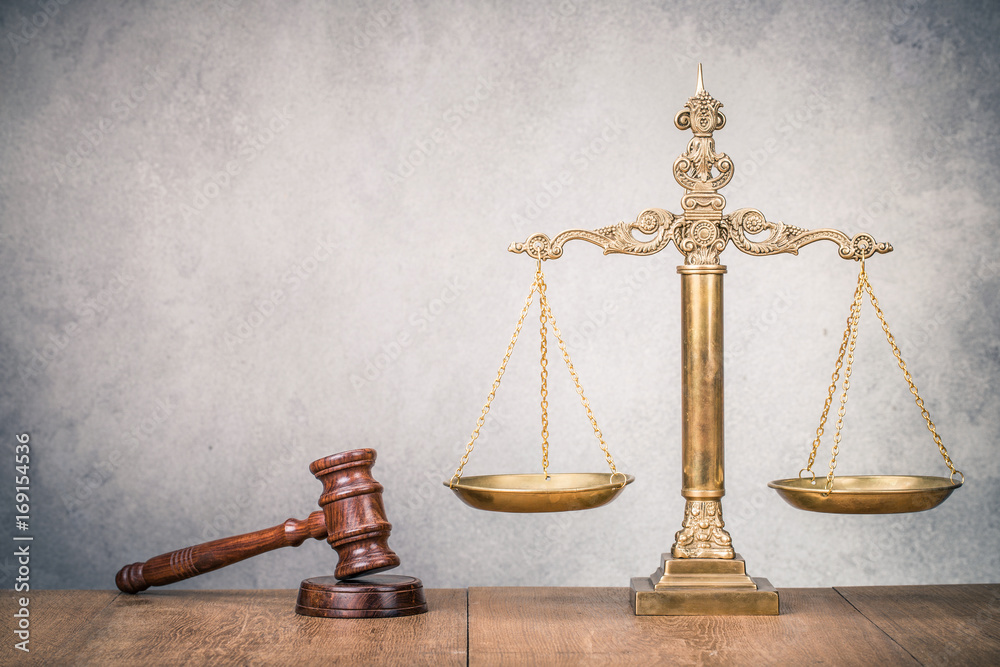 Bronze law scales and wooden gavel on table. Symbols of justice. Vintage old style filtered photo Bronze law scales and wooden gavel on table. Symbols of justice. Vintage old style filtered photo