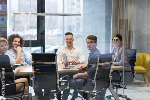 Startup Business Team At A Meeting at modern office building