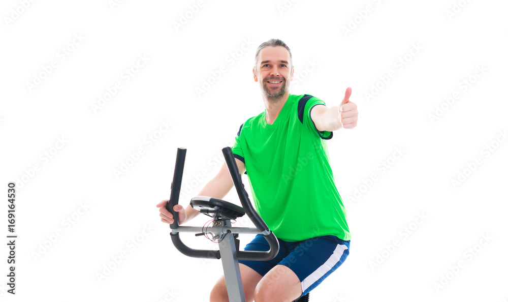 man with thumb up train with fitness machine man with thumb up train with fitness machine