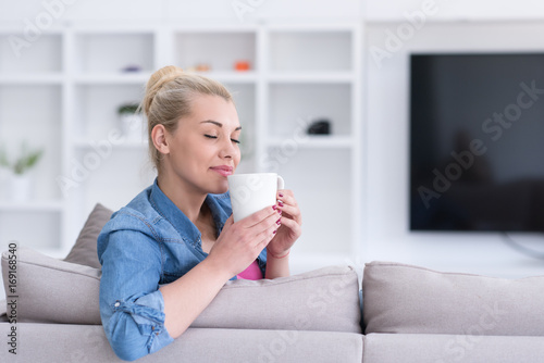 woman enjoying a cup of coffee
