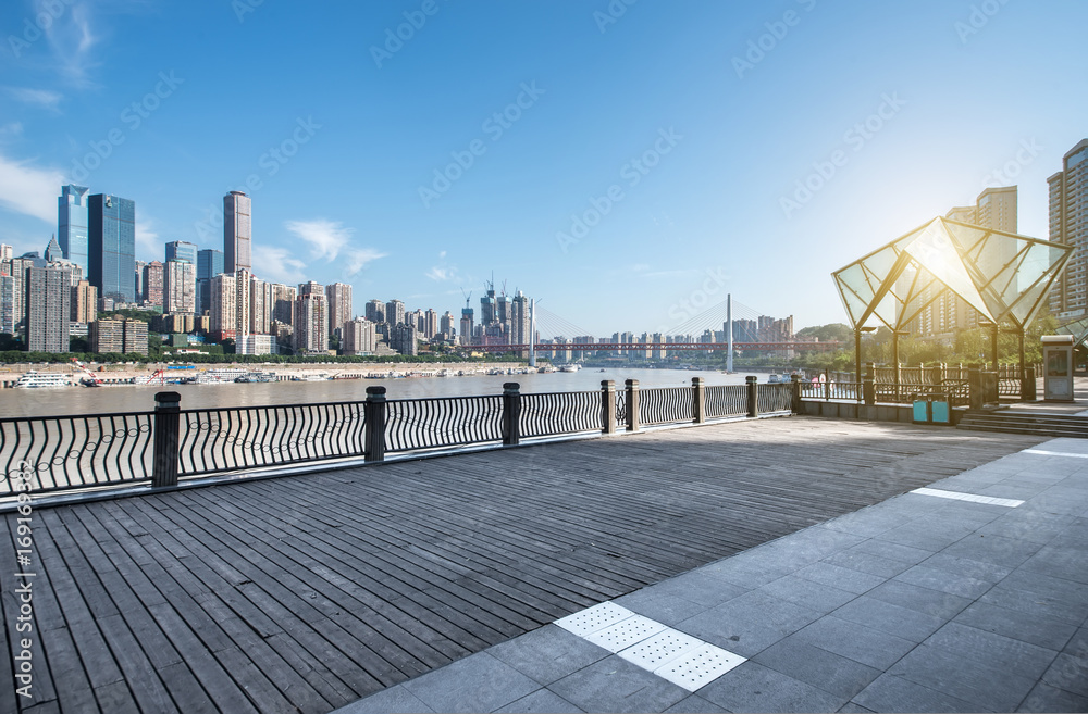Chongqing city skyline, with wooden floors and guardrails.