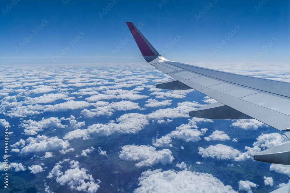 Fototapeta premium Over cloudy sky. View from plane.