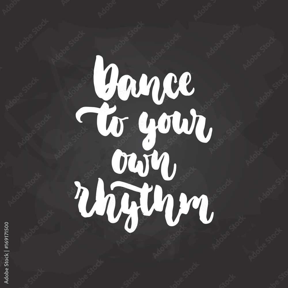 Dance to yor own rhythm - lettering dancing calligraphy quote drawn by ink in white color on the black chalkboard background. Fun hand drawn lettering inscription.