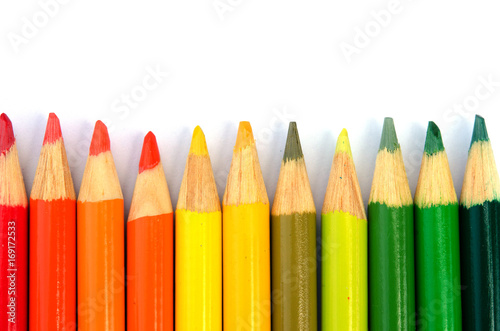 Wooden pencil on a white background