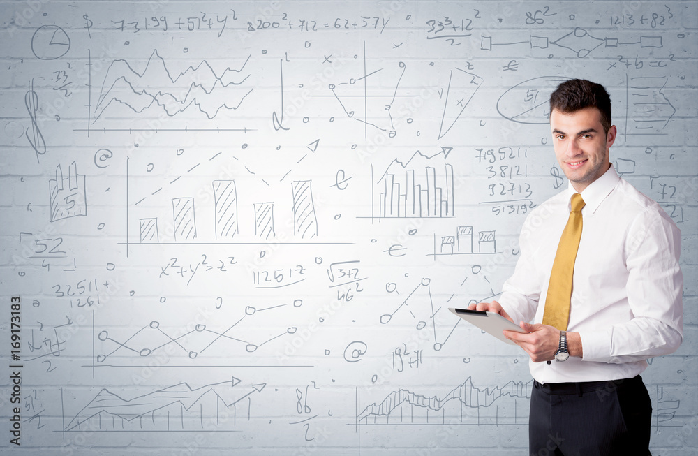 Salesman standing with drawn graph charts Salesman standing with drawn graph charts