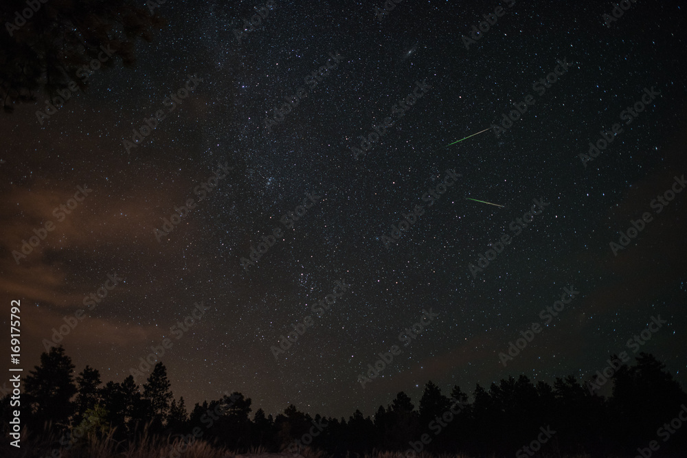 shooting star in the nights sky shooting star in the nights sky