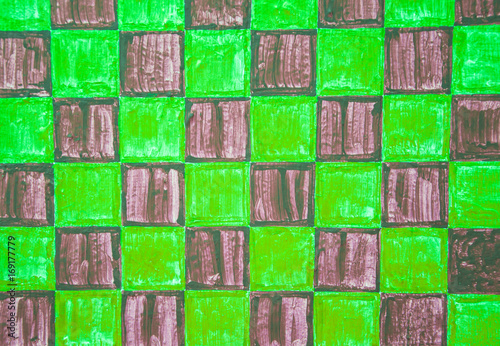 Black and neon green checkerboard design on wood panel background