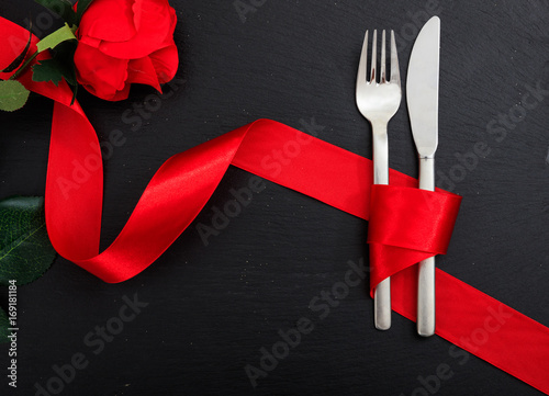 Valentines day place setting on black background