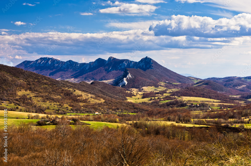 Meadows and peaks,  Homolje mountains landscape on a sunny day in early spring, east Serbia